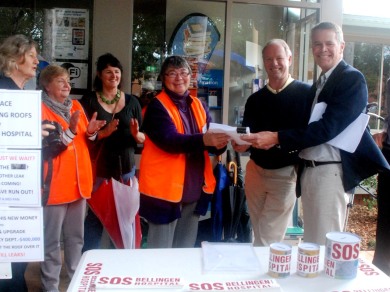 Barb handing the Re-Roofing Petition petition to The Hon. Andrew Stoner & Mr Andrew Fraser